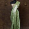 Pastel green banarasi silk paudi jaal saree