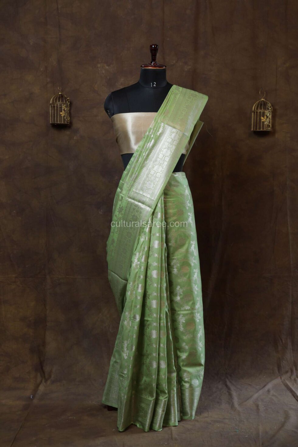 Pastel green banarasi silk paudi jaal saree