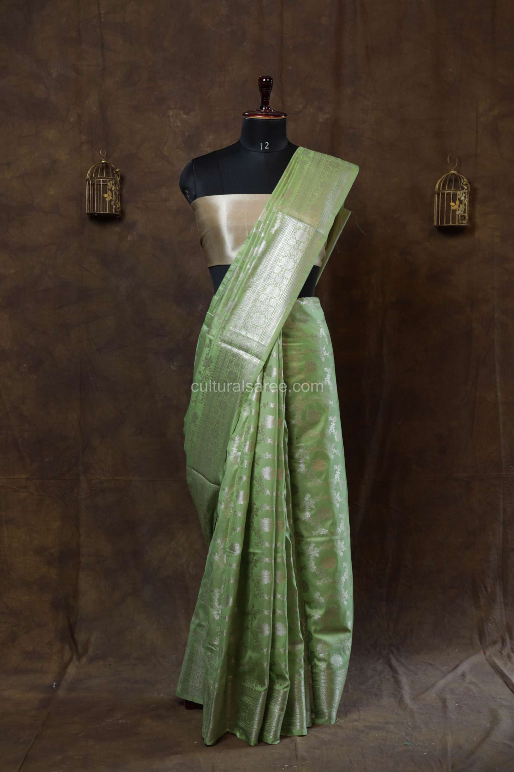 Pastel green banarasi silk paudi jaal saree