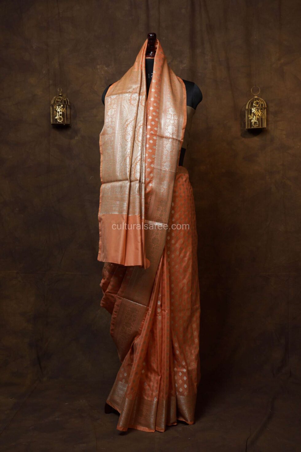 Sunset peach banarasi silk paudi saree with floral border