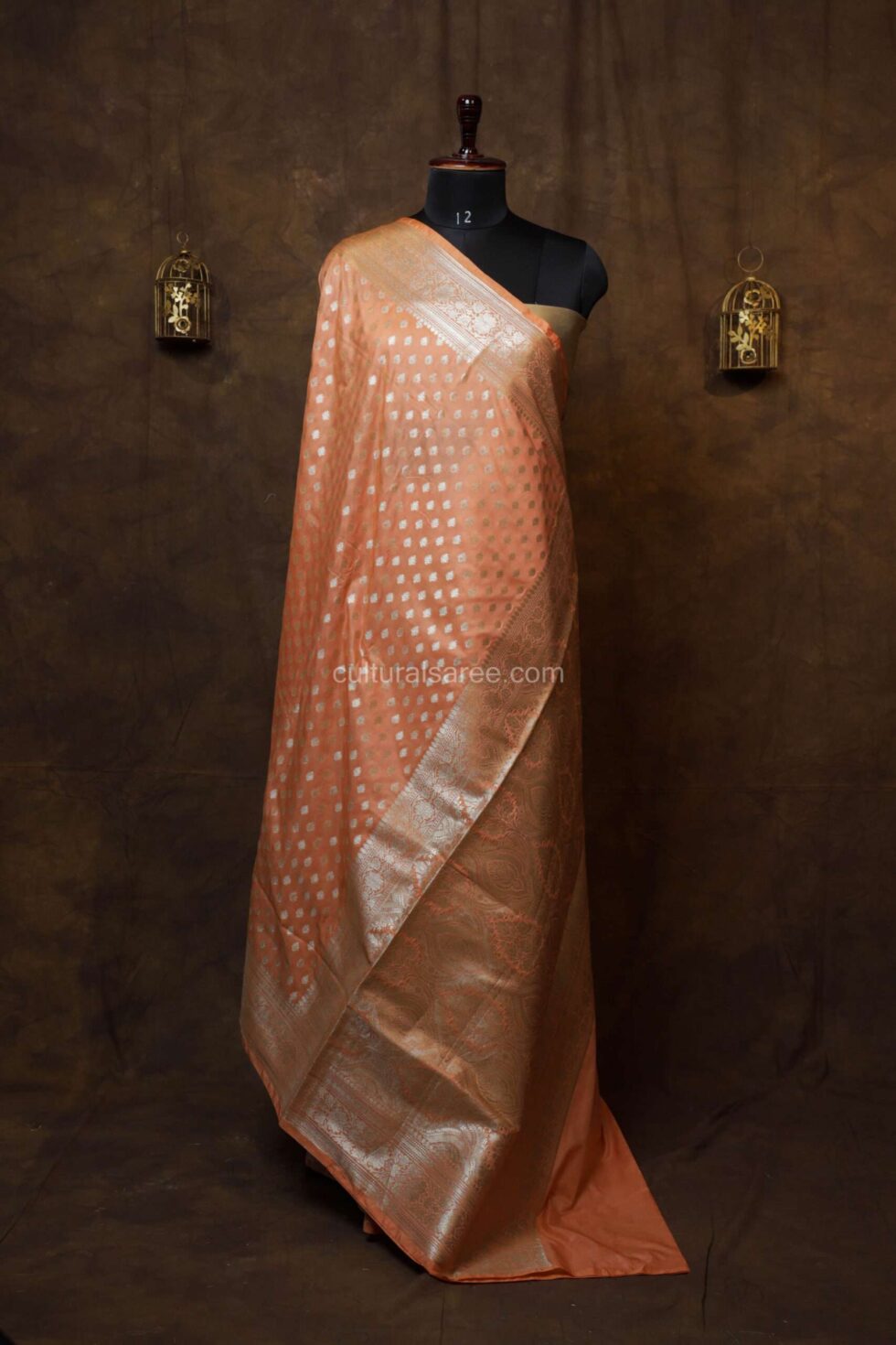 Sunset peach banarasi silk paudi saree with floral Pallu