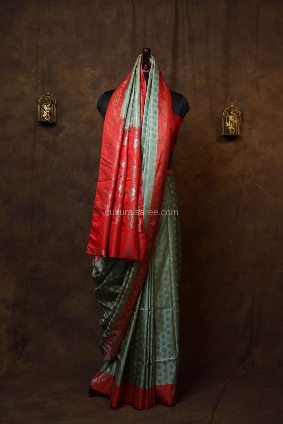 pastel green silk saree with red border