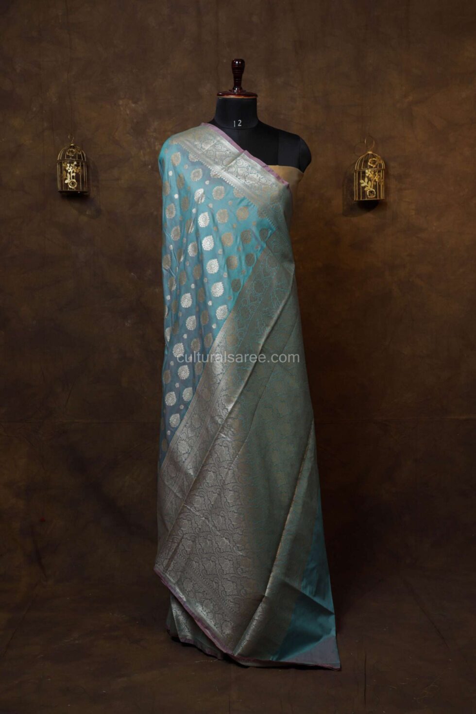 Baby blue banarasi silk paudi saree with beautiful buta motifs achal