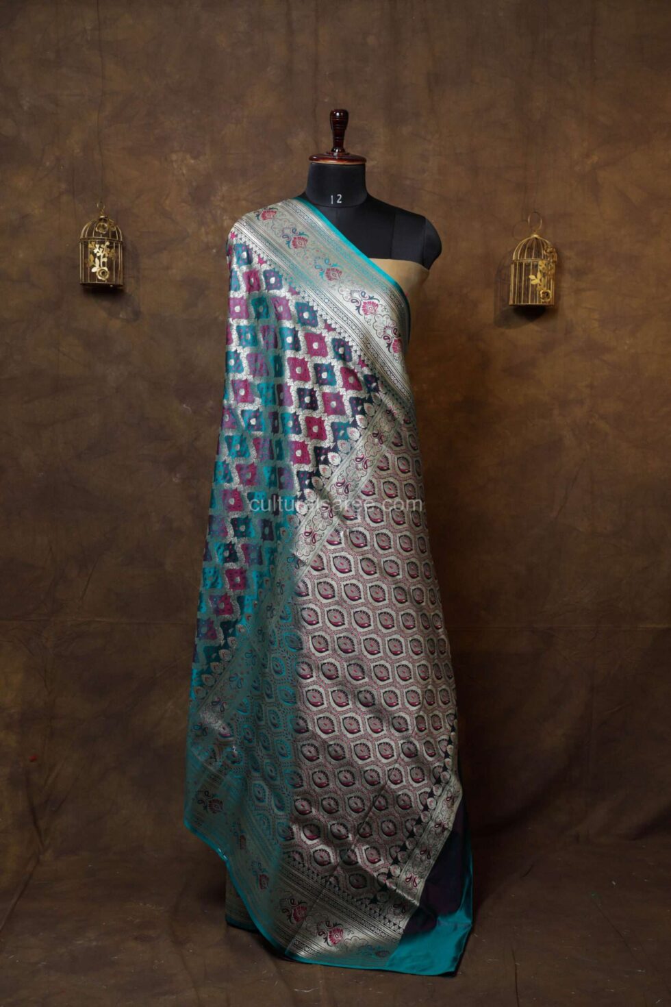 Majestic Peacock Blue banarasi rang kart silk saree with silver border and pallu