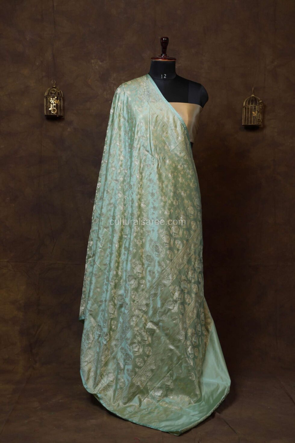 Mint green banarasi silk saree with floral motifs